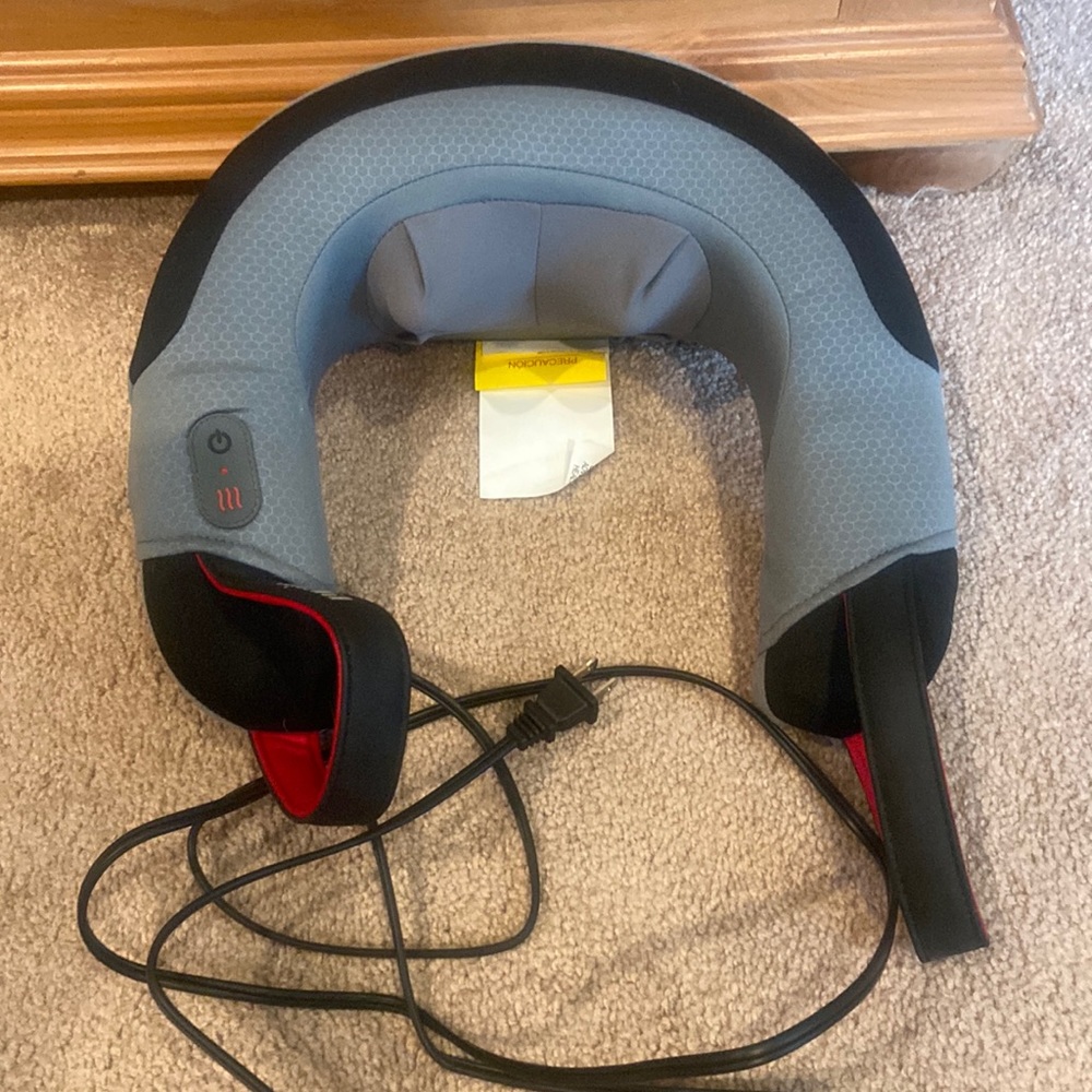 Electric neck massager with heat.